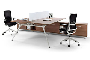 DESKS SUPPORTED BY SPINE STORAGE UNIT